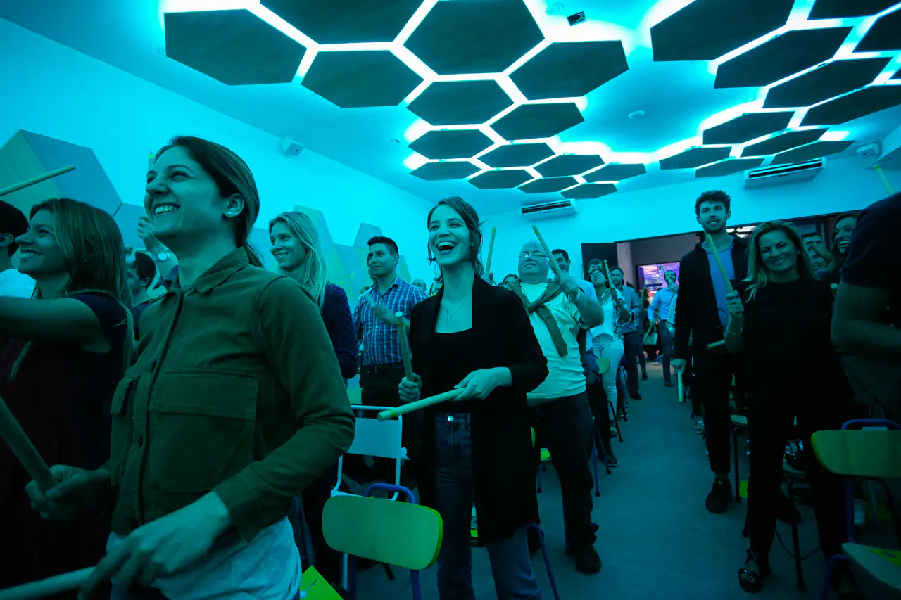 Attendees at an event inside La Maquinita Co Innovation Lab